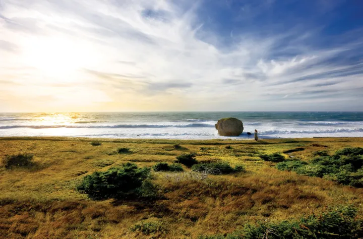 Girl and Rock, The Arches Provincial Park - Copyright Barrett & MacKay Photo